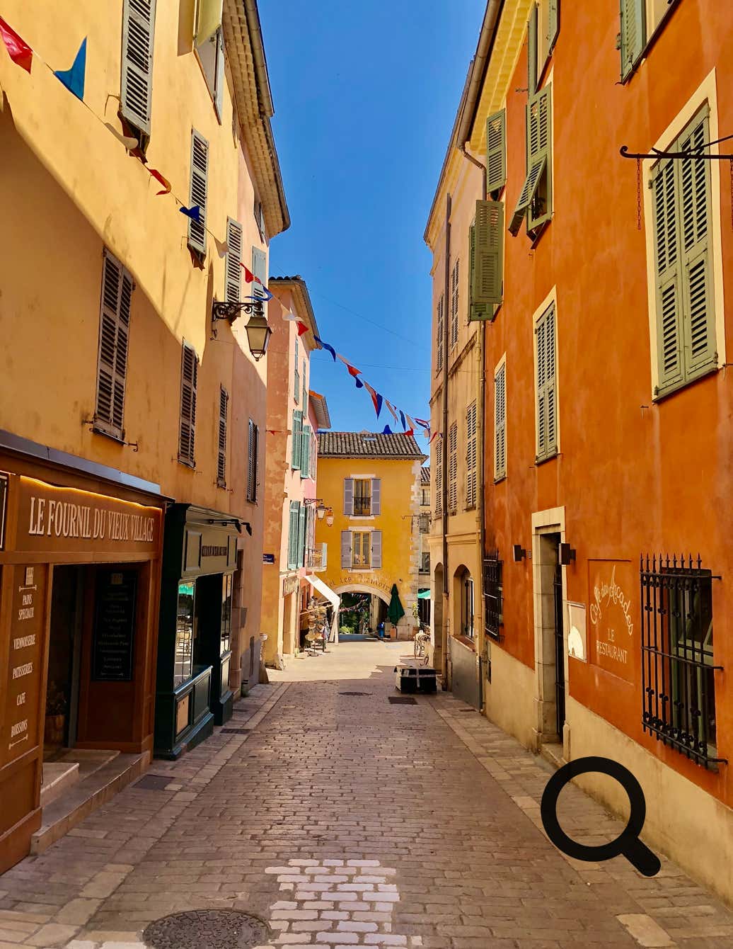 Wandering through its cobbled streets is like a journey back in time, with colorful facades, flower-adorned windows, and shaded little squares. 